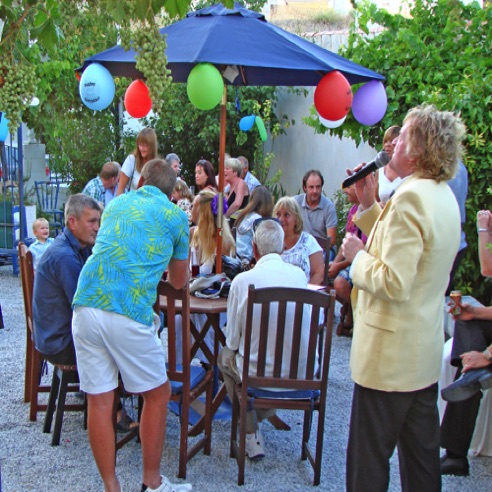 Party in full swing with entertainment (Is that Rod Stewart?)